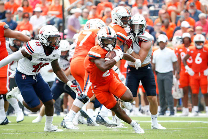 Virginia Cavaliers running back Perris Jones (2) carries the ball against the Richmond Spiders during the first half at Scott Stadium.